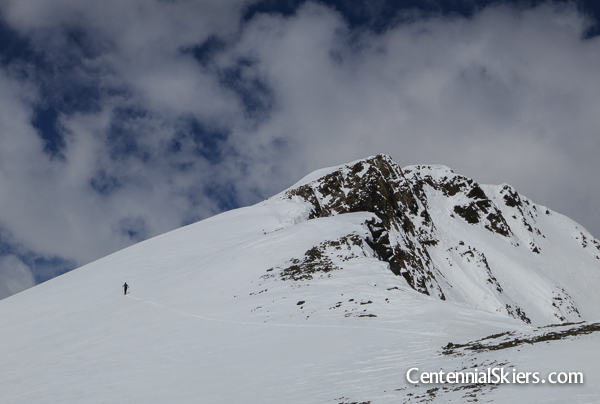 It's a well defined mountain with a rather small summit and multiple ski options-- it should have a proper name.